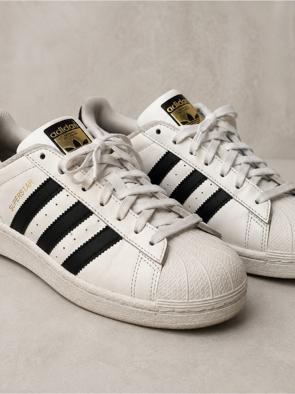 Adidas Superstar Leather Sneakers in White with Black Stripes